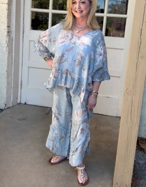 Floral Linen Pant with Raw Ruffle Detail in Blue at ooh la la! in Grapevine TX 76051