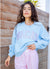 Queen of Sparkles Light Blue ‘VACAY’ Sweatshirt at ooh la la! in Grapevine TX 76051
