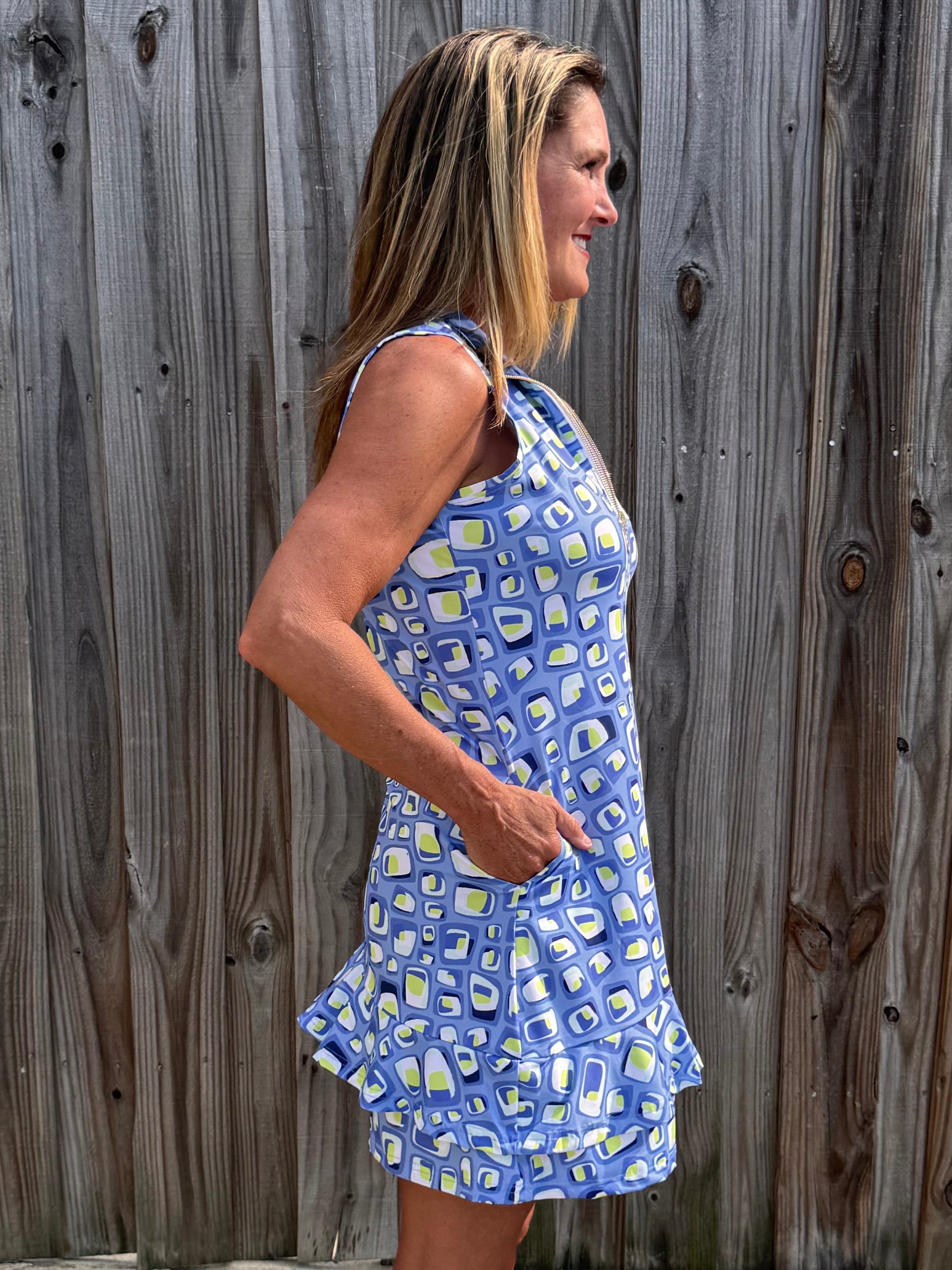 Ana Clare, Women's sport dress, golf dress with pockets, tennis dress ruffle hem, SPF 50 athletic wear, performance golf apparel, UV protective dress, ladies athleisure dress. at ooh la la! in Grapevine TX 76051