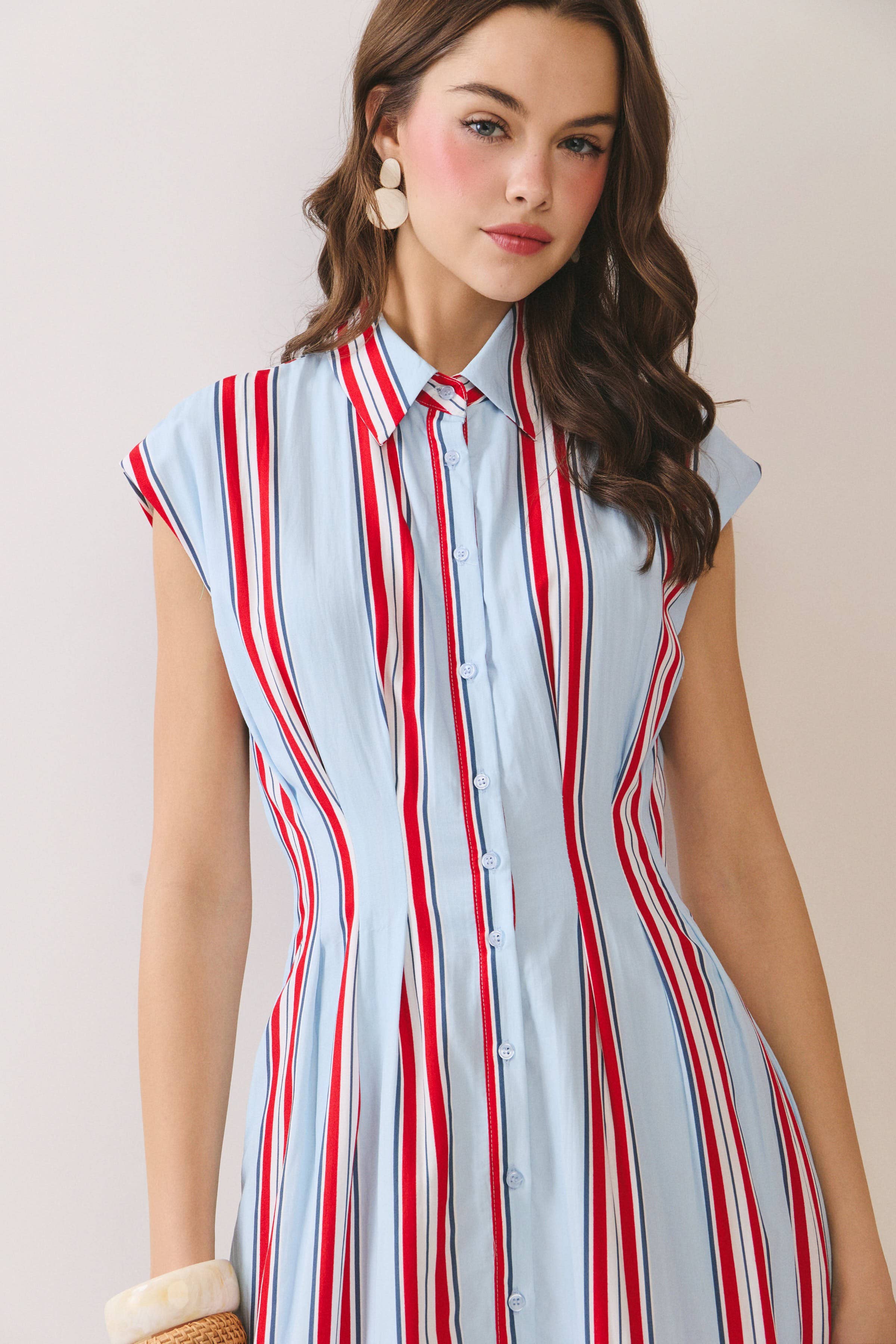 Americana dress, striped midi dress, shirt dress with pockets, A-line summer dress, button down dress, red white and blue dress, slimming vertical stripes, patriotic fashion. at ooh la la! in Grapevine TX 76051