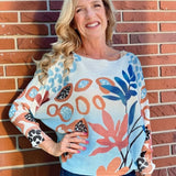 Abstract Pink & Blue Batwing Sweater at ooh la la! in Grapevine TX 76051