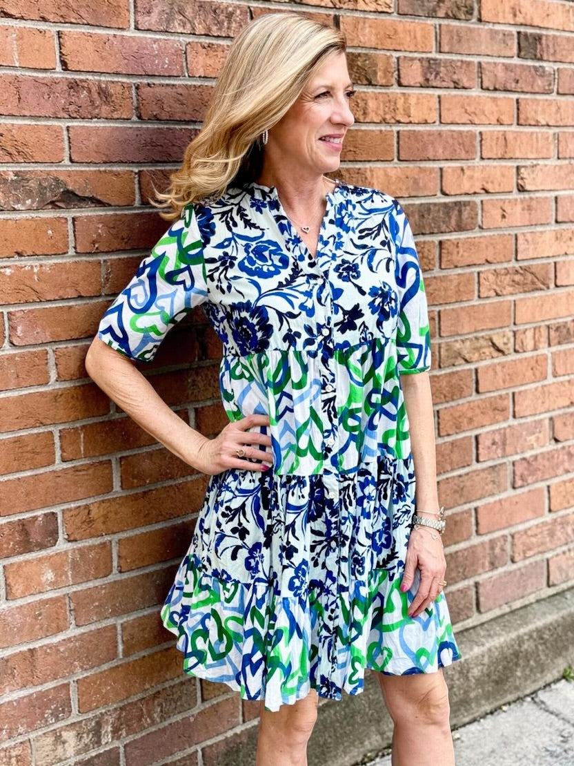 Organic cotton dress, floral shirt dress, tiered summer dress, Dress Addict, crinkle cotton dress, sustainable fashion, mixed floral and hearts print, summer dresses with pockets. at ooh la la in Grapevine TX 76051