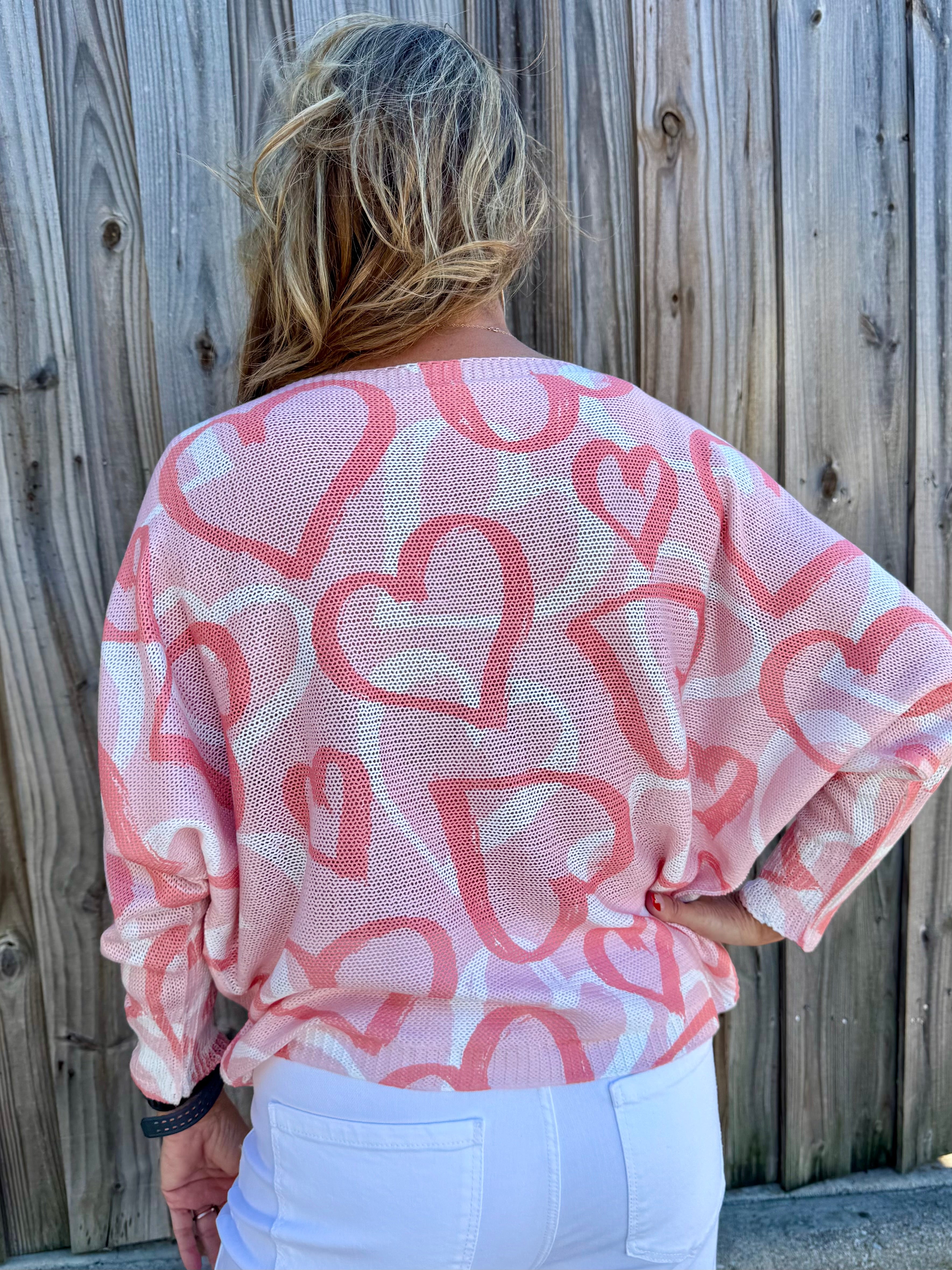 Soft Pink Hearts Batwing Sweater at ooh la la! in Grapevine TX 76051