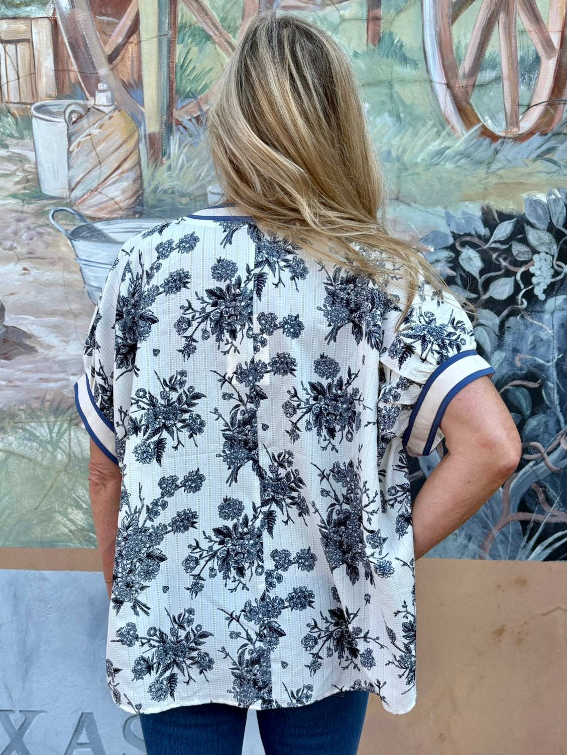 Floral Print Oversized Pullover Top at ooh la la! in Grapevine TX 76051