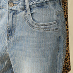 rhinestone jeans, wide leg denim, sparkly party pants, mid-rise embellished jeans, women's statement denim, light wash flare jeans, crystal encrusted jeans 
ooh la la! in Grapevine TX 76051