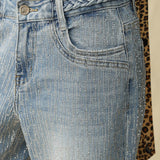 rhinestone jeans, wide leg denim, sparkly party pants, mid-rise embellished jeans, women's statement denim, light wash flare jeans, crystal encrusted jeans 
ooh la la! in Grapevine TX 76051