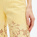Butter yellow Wide leg jeans, floral lace denim, rhinestone jeans, high rise wide leg, pastel yellow jeans, pink lace jeans, statement denim, women’s high stretch jeans. at ooh la la! in Grapevine TX 76051