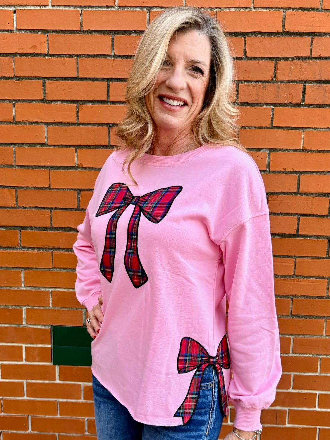 Simply Southern Plaid Bows Applique Sweatshirt in pink at ooh la la! in Grapevine TX 76051