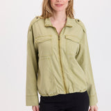 XCVI Tace Tencel Twill Relaxed Bomber Jacket in Artichoke Pigment green on model