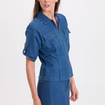 XCVI Tammen Indigo Twill Short Sleeve Shacket in Corscate Wash blue denim on model at ooh la la! in Grapevine TX 76051