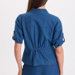 XCVI Tammen Indigo Twill Short Sleeve Shacket in Corscate Wash blue denim on model at ooh la la! in Grapevine TX 76051