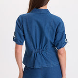 XCVI Tammen Indigo Twill Short Sleeve Shacket in Corscate Wash blue denim on model at ooh la la! in Grapevine TX 76051