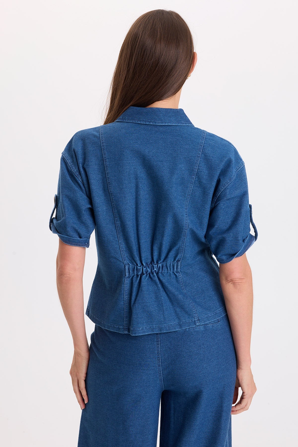 XCVI Tammen Indigo Twill Short Sleeve Shacket in Corscate Wash blue denim on model at ooh la la! in Grapevine TX 76051