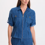 XCVI Tammen Indigo Twill Short Sleeve Shacket in Corscate Wash blue denim on model at ooh la la! in Grapevine TX 76051