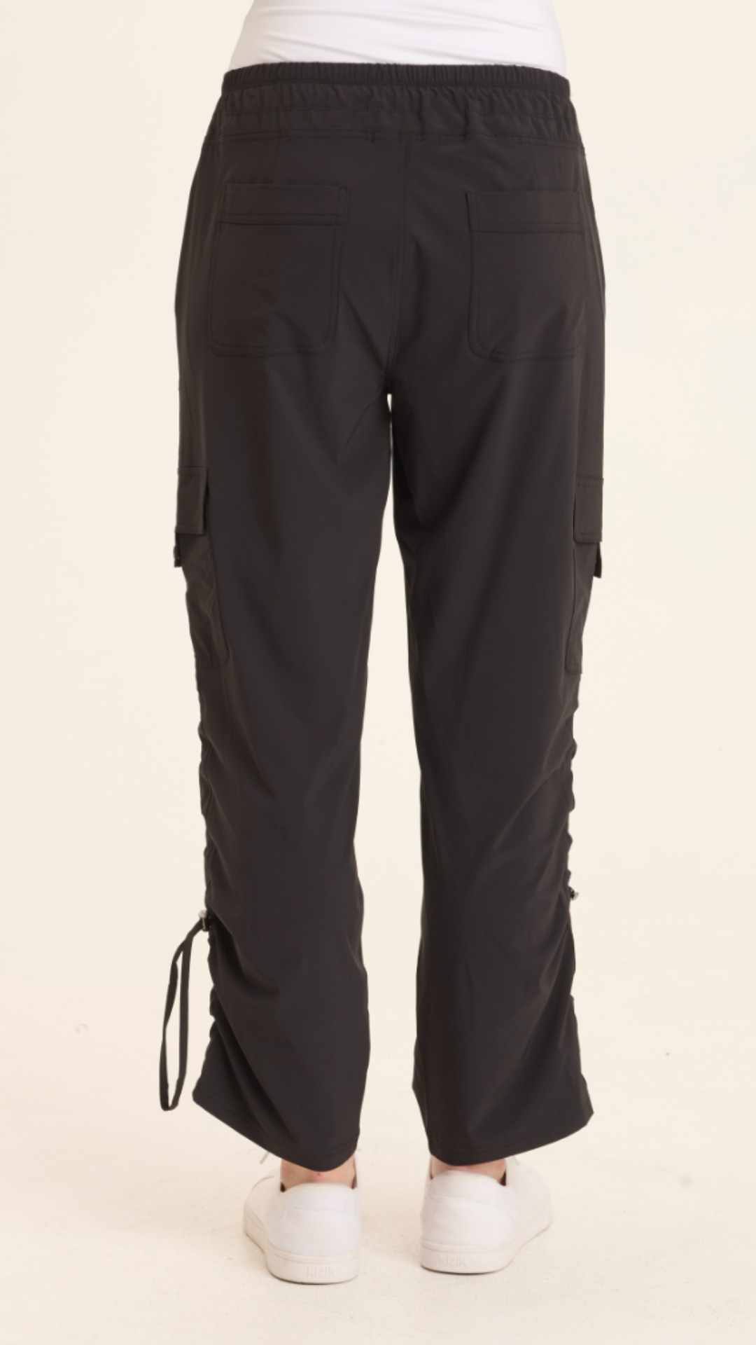 XCVI Bader Active Cargo Pant in black with drawstring waist, side pockets  and ruched ankles at ooh la la! in Grapevine TX 76051