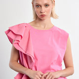 Pink Asymmetrical top, ruffle crop top, sporty chic shirt, women's statement top, oversized cropped tee, streetwear fashion, architectural ruffle blouse.
at ooh la la! in Grapevine TX 76051