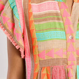 Boho beach dress, neon summer dress, flutter sleeve mini, geometric print dress, tassel trim dress, resort wear for women, cotton v-neck dress, vacation outfits, colorful sun dress. at ooh la la! in Grapevine TX 76051