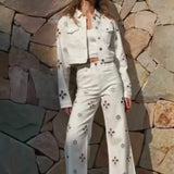 Pearl-Embellished Petal Cutout Straight Leg Jeans