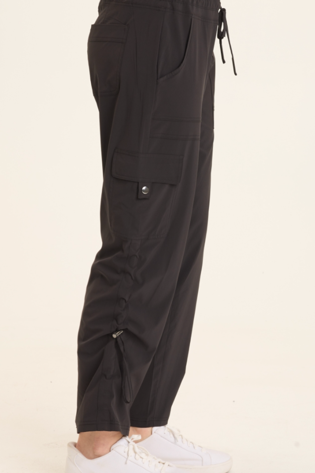 XCVI Bader Active Cargo Pant in black with drawstring waist, side pockets  and ruched ankles at ooh la la! in Grapevine TX 76051