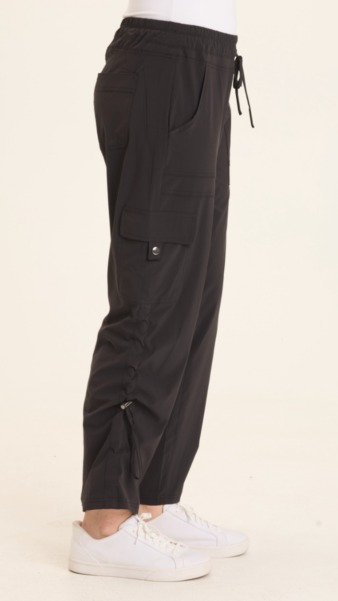 XCVI Bader Active Cargo Pant in black with drawstring waist, side pockets  and ruched ankles at ooh la la! in Grapevine TX 76051