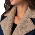 Close-up of Liverpool sherpa trimmed notch collar denim jacket in rinse wash on model