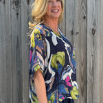 Abstract Flower Print Silk Raw Edge Blouse in navy at ooh la la! in Grapevine TX 76051