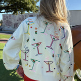 Queen of Sparkles White Multi Cosmo & Martini Button Up Cardigan With Rainbow Trim at ooh la la! in Grapevine TX 76051