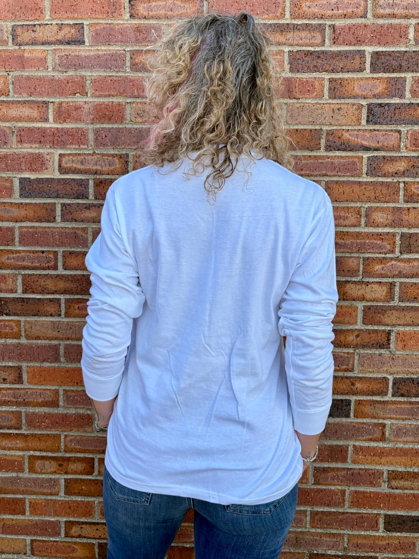 Peppermint Stick Merry Christmas Long Sleeve Tee at ooh la la! in Grapevine TX 76051