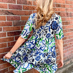 Organic cotton dress, floral shirt dress, tiered summer dress, Dress Addict, crinkle cotton dress, sustainable fashion, mixed floral and hearts print, summer dresses with pockets. at ooh la la in Grapevine TX 76051