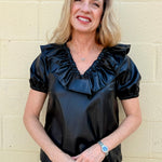 Ruffle V Neck Faux Leather Top in black at ooh la la in Grapevine TX 76051