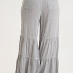 XCVI Lando Wide Leg Pants in Soft Pebble Pigment, back view with tiered ruffles