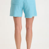 XCVI Elvio Shorts in Mermaid Tail Pigment aqua terry cloth, back view on model