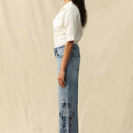 Falling Leaves Crystallized Cutouts Mid Rise Wide Leg Statement Jeans at ooh la la! in Grapevine TX 76051