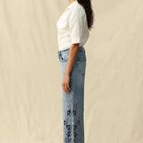 Falling Leaves Crystallized Cutouts Mid Rise Wide Leg Statement Jeans at ooh la la! in Grapevine TX 76051