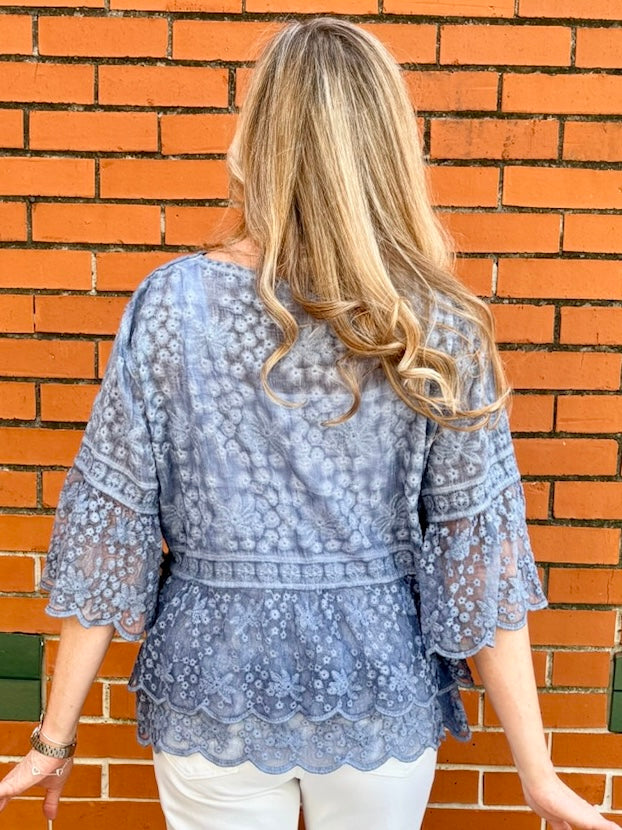 Blue Lace blouse, cotton boho top, bell sleeve shirt, floral embroidery top, scalloped hem blouse, feminine V-neck top, tiered lace top, bohemian fashion, white lace blouse, black vintage style top. at ooh la la! in Grapevine TX 76051