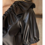 Ruffle V Neck Faux Leather Top in black at ooh la la in Grapevine TX 76051