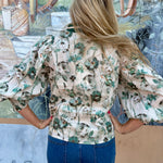 Floral Pattern Smocked Cuff Top at Ooh La La! in Grapevine TX 76051