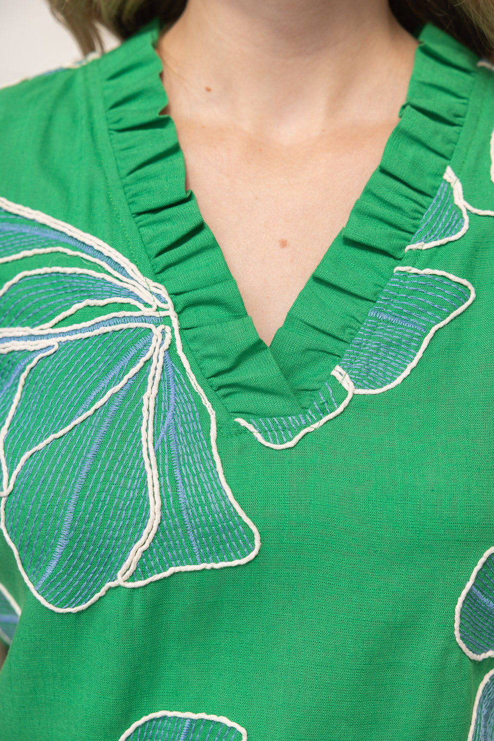 Floral embroidered top, green ruffle blouse, V-neck summer top, women's boho clothing, embroidered floral shirt, ruffle sleeve top, woven summer blouse.
ooh la la! in Grapevine TX 76051