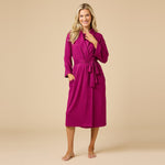 Woman wearing Softies Dream Shawl Collar Robe in magenta at ooh la la! in Grapevine TX 76051
