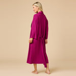 Woman wearing Softies Dream Shawl Collar Robe in magenta at ooh la la! in Grapevine TX 76051