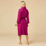 Woman wearing Softies Dream Shawl Collar Robe in magenta at ooh la la! in Grapevine TX 76051