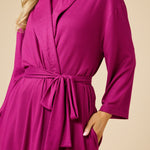 Woman wearing Softies Dream Shawl Collar Robe in magenta at ooh la la! in Grapevine TX 76051