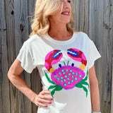 Queen of Sparkles, Sequin Crab Tee, Rainbow Sequin Shirt, Coastal Chic Apparel, Luxury Graphic Tee, Rhinestone Crab Top, Beach Vacation Outfit, Designer White Tee, Summer Sparkle Fashion. at ooh la la! in Grapevine TX 76051