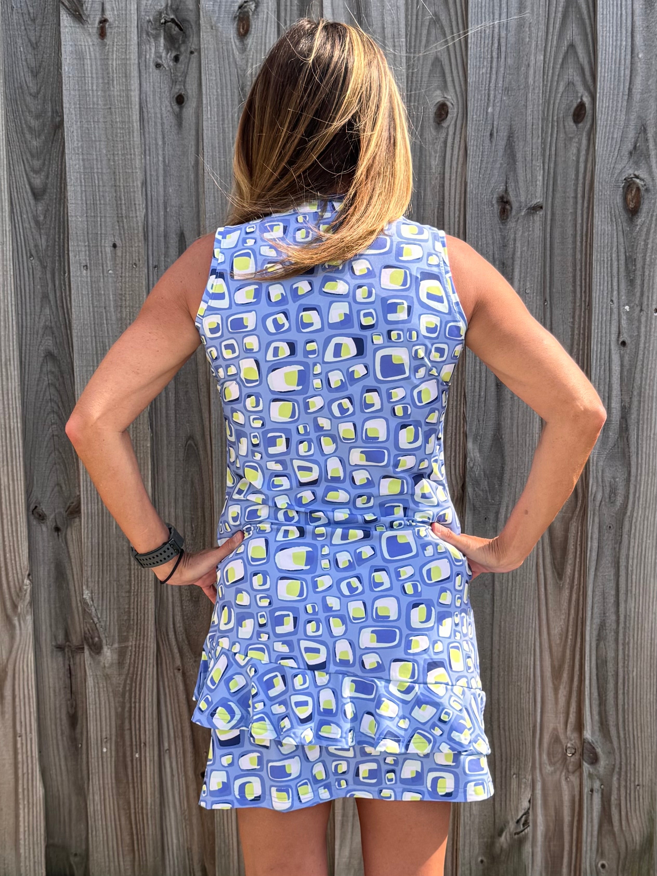 Ana Clare, Women's sport dress, golf dress with pockets, tennis dress ruffle hem, SPF 50 athletic wear, performance golf apparel, UV protective dress, ladies athleisure dress. at ooh la la! in Grapevine TX 76051
