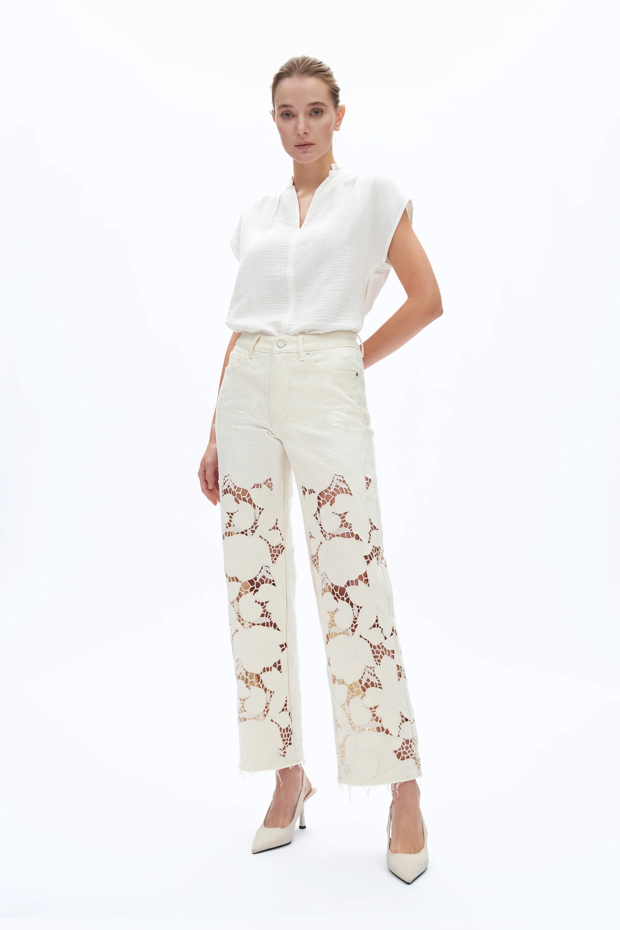 off white floral cutout jeans, embroidered straight leg pants, women's cream denim, high rise relaxed jeans, boho lace pants, luxury embroidered denim, off white floral trousers at ooh la la in Grapevine TX 76051