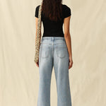 rhinestone jeans, wide leg denim, sparkly party pants, mid-rise embellished jeans, women's statement denim, light wash flare jeans, crystal encrusted jeans 
ooh la la! in Grapevine TX 76051