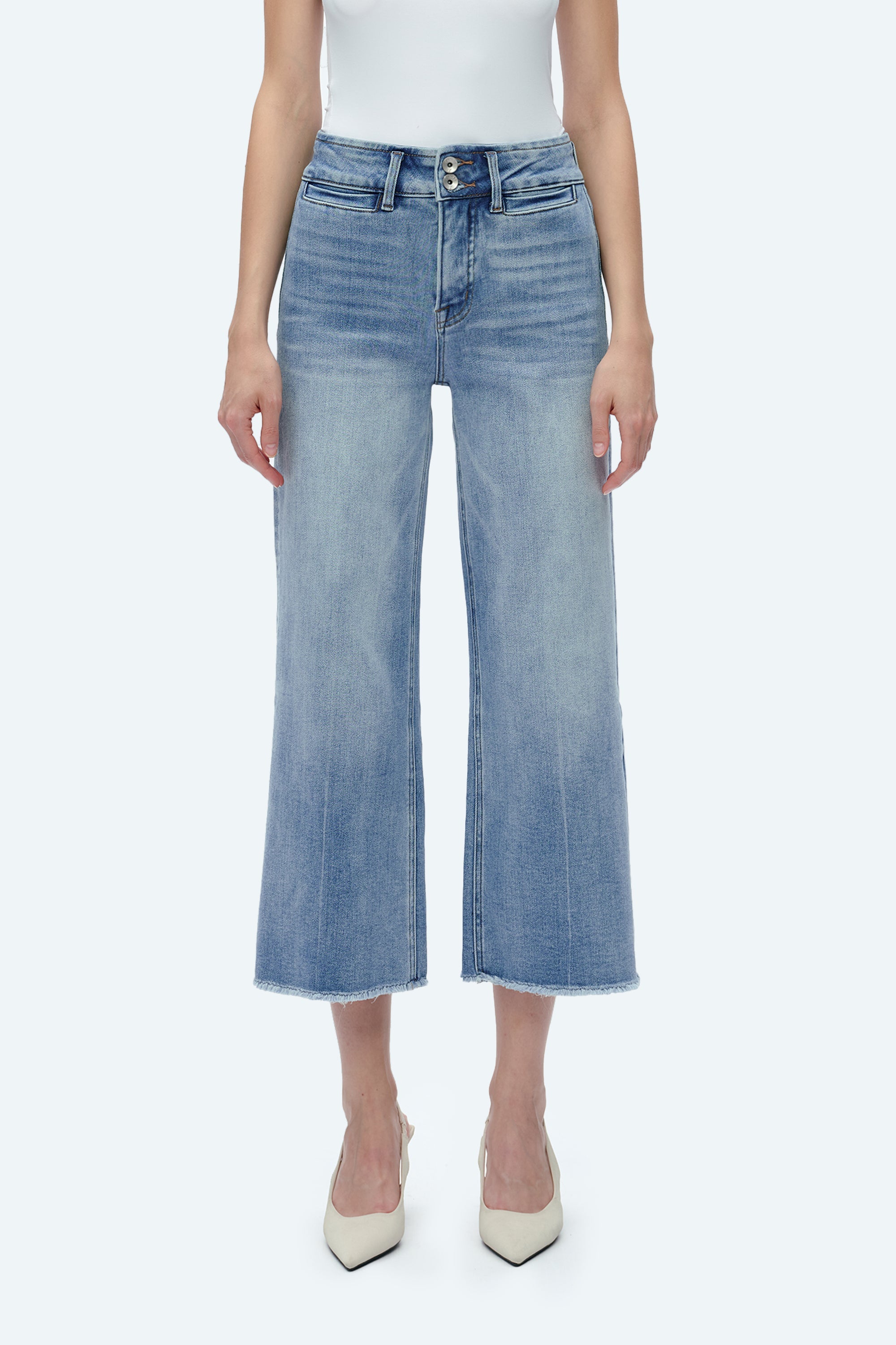 High-rise wide-leg cropped jeans in light blue denim with raw hem