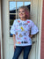 Las Vegas Embroidered Bell Sleeve Top at ooh la la! in Grapevine TX 76051