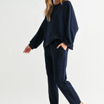 Navy Kaelynn Pant, Joh, luxury straight leg pants, matte crepe knit trousers, minimalist women's loungewear, designer elastic waist pants, premium stretch crepe pants, high-end coordinated sets at ooh la la! in Grapevine TX 76051