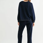 Navy Kaely Top, Joh Brand, luxury long sleeve top, matte stretch crepe knit, minimalist designer top, tonal stitch detail, premium women's knitwear, high-end loungewear, elegant relaxed fit top at ooh la la! in Grapevine TX 76051